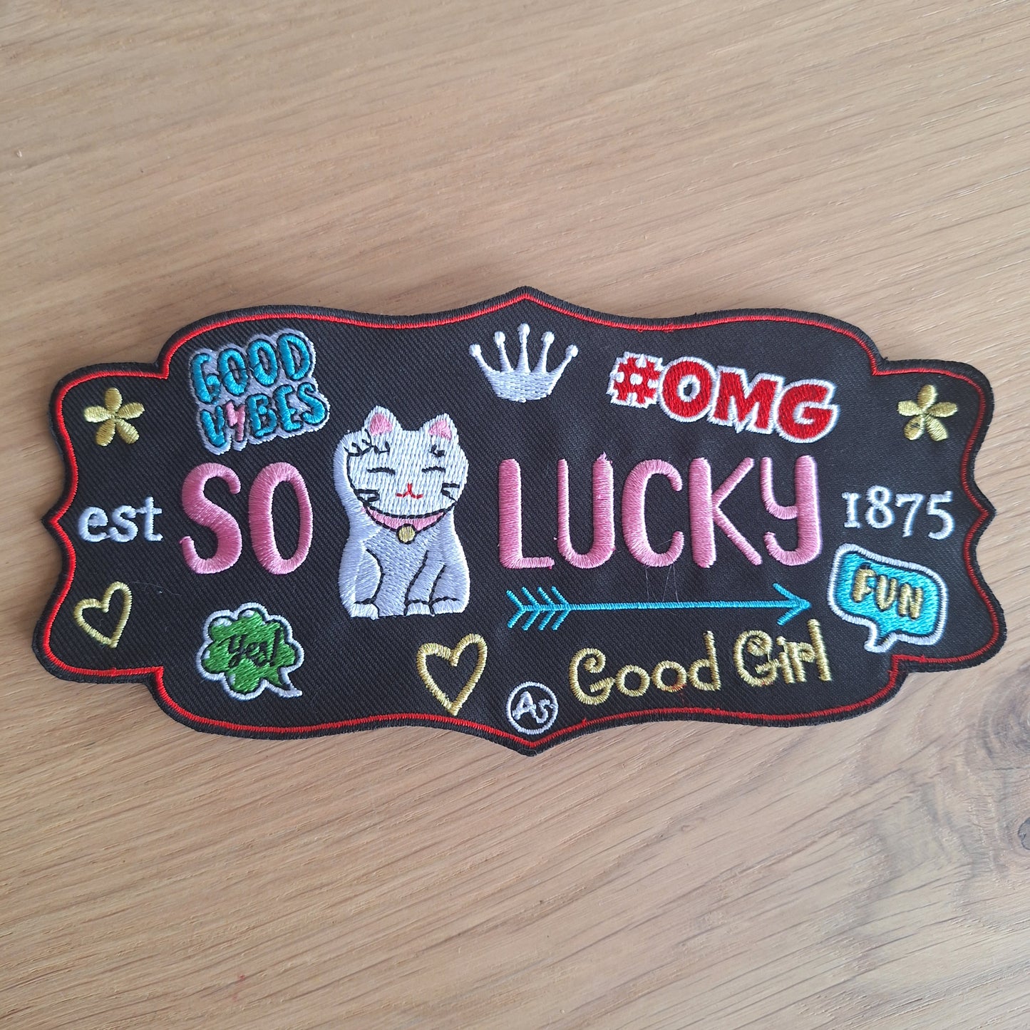 So Lucky embleem