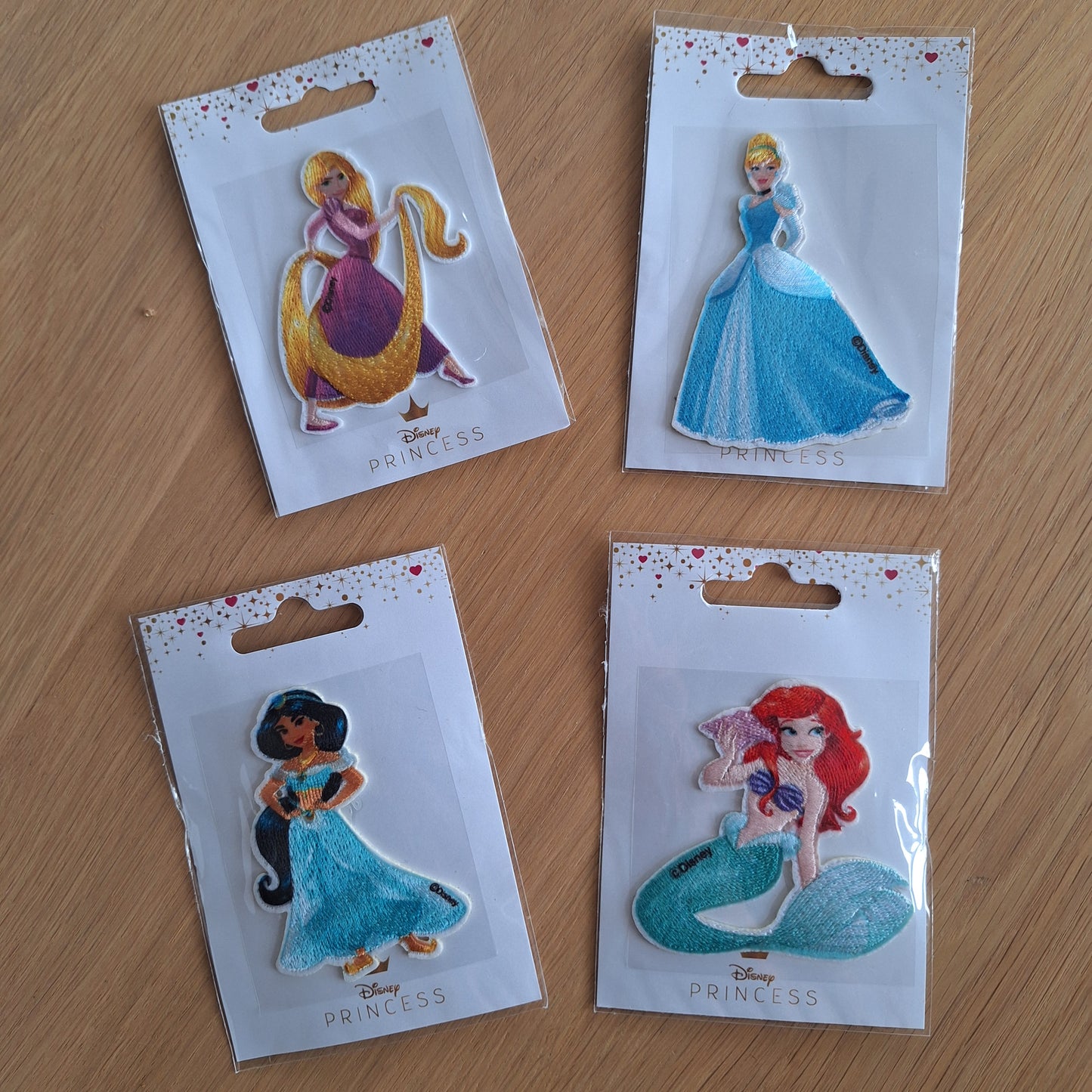 Disney Assepoester embleem