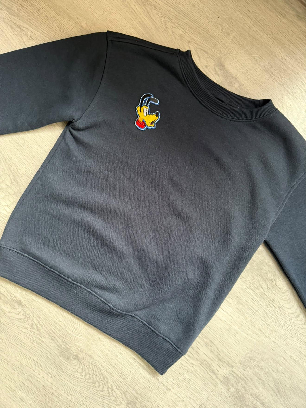 Pluto strijkembleem op trui