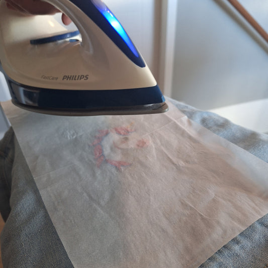 strijkembleem bevestigen