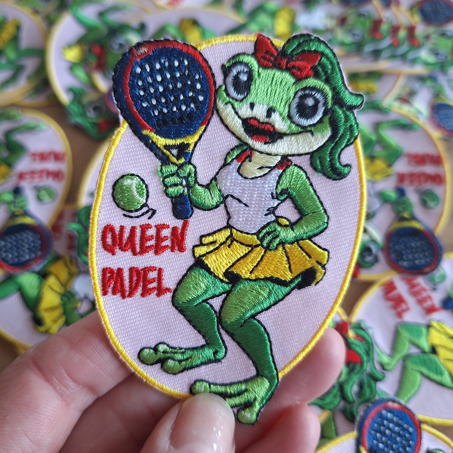 Queen padel embleem